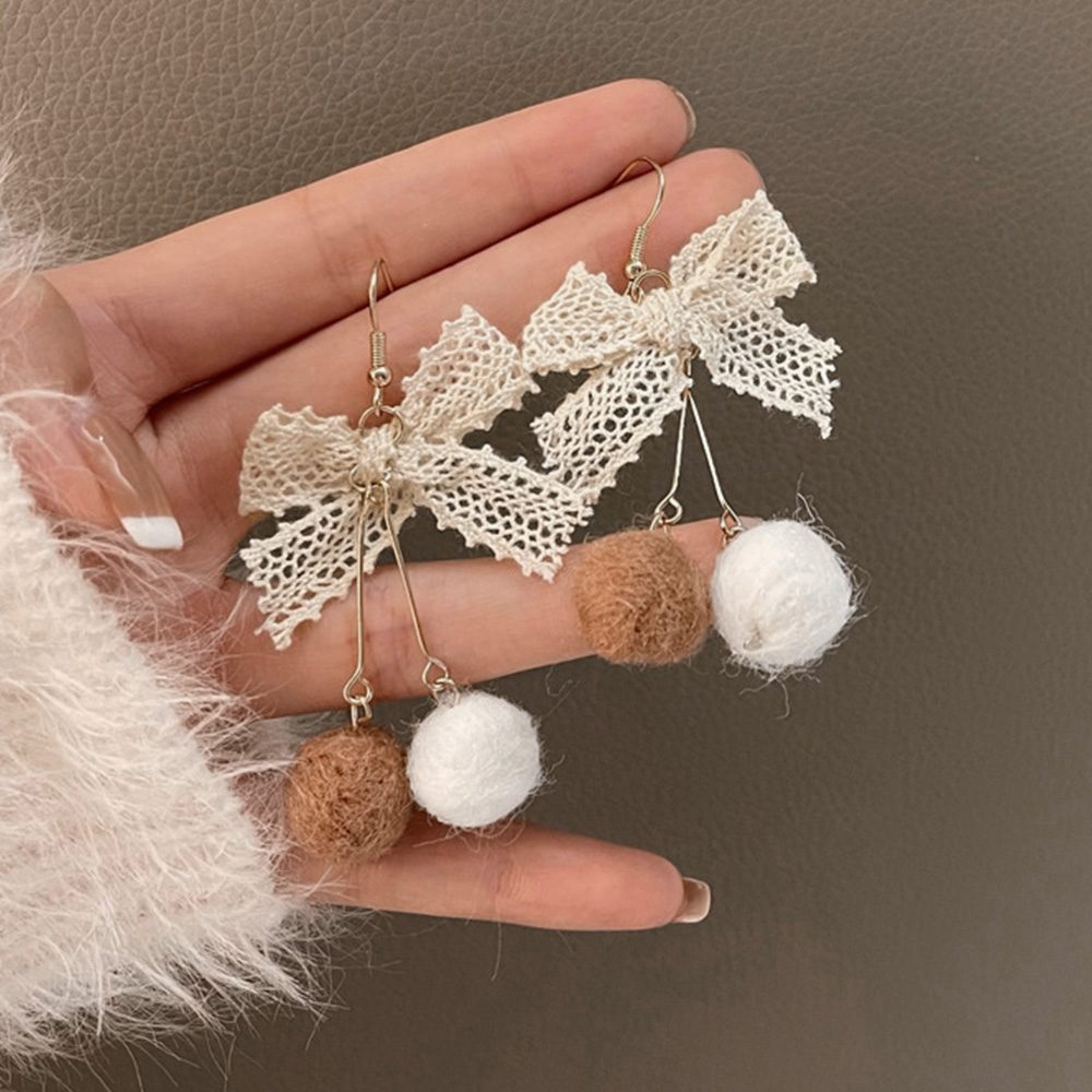 リボンピアス レディース ポンポンピアス