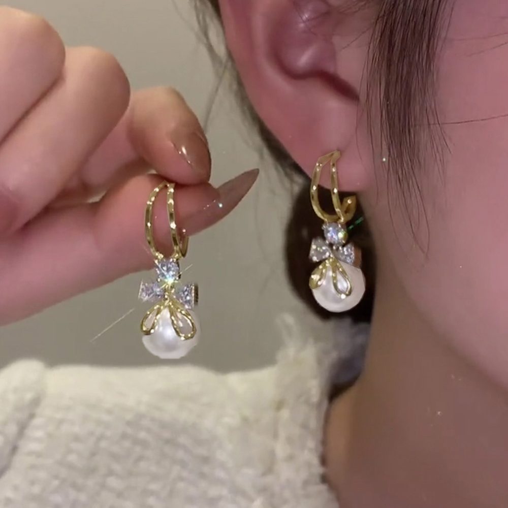ピアス 韓国 揺れる パールリボンピアス